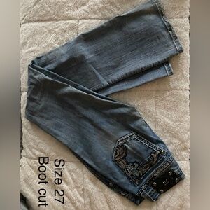 Vintage Miss Me faded denim jeans.